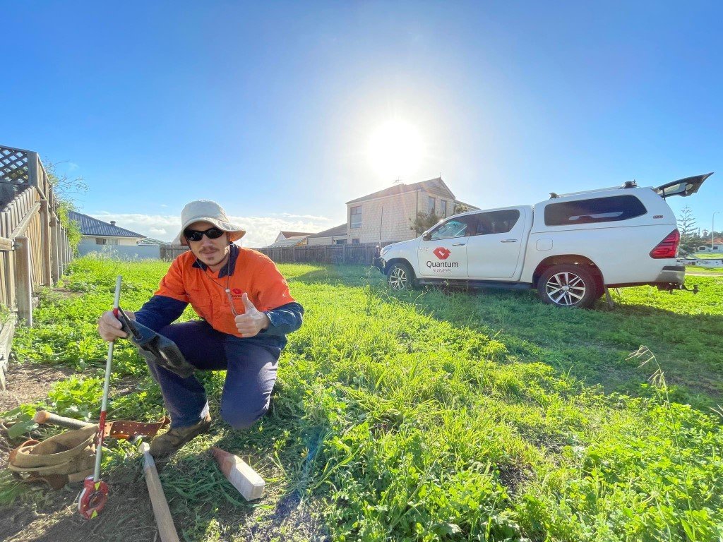 Surveyor add a peg to a boundary at a property in Geraldton